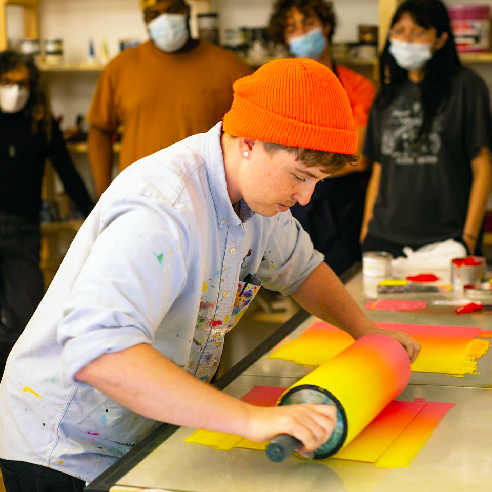 A printmaking artist at work